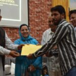 Minister Sakeena Itoo felicitated NEET achievers & meritorious 10th, 12th students at GDC Pulwama, applauding their excellence amid challenges.