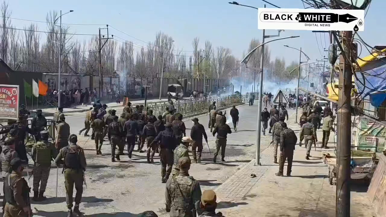 Police use tear gas shells to disperse people protesting the killing of Iran’s supreme leader, Ayatollah Ali Khamenei, in Srinagar.