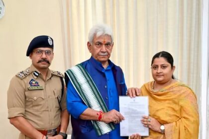 Hon'ble Lieutenant Governor Manoj Sinha hands over an appointment letter on compassionate grounds to Dr. Vaishali Misra, wife of late J&K Police Sub-Inspector Sachin Verma.